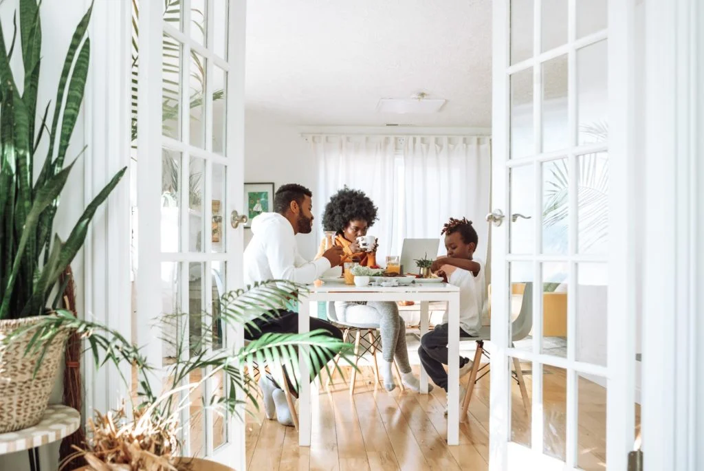 a group of people sitting at a table