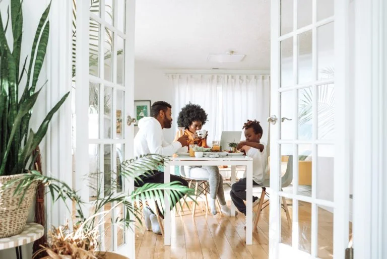 a group of people sitting at a table